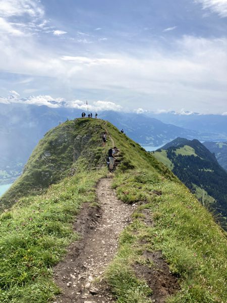 Die Wolken lösen sich auf. Der Suggiturm im Sonnenschein. Die Wolken lösen sich auf. Der Suggiturm im Sonnenschein.